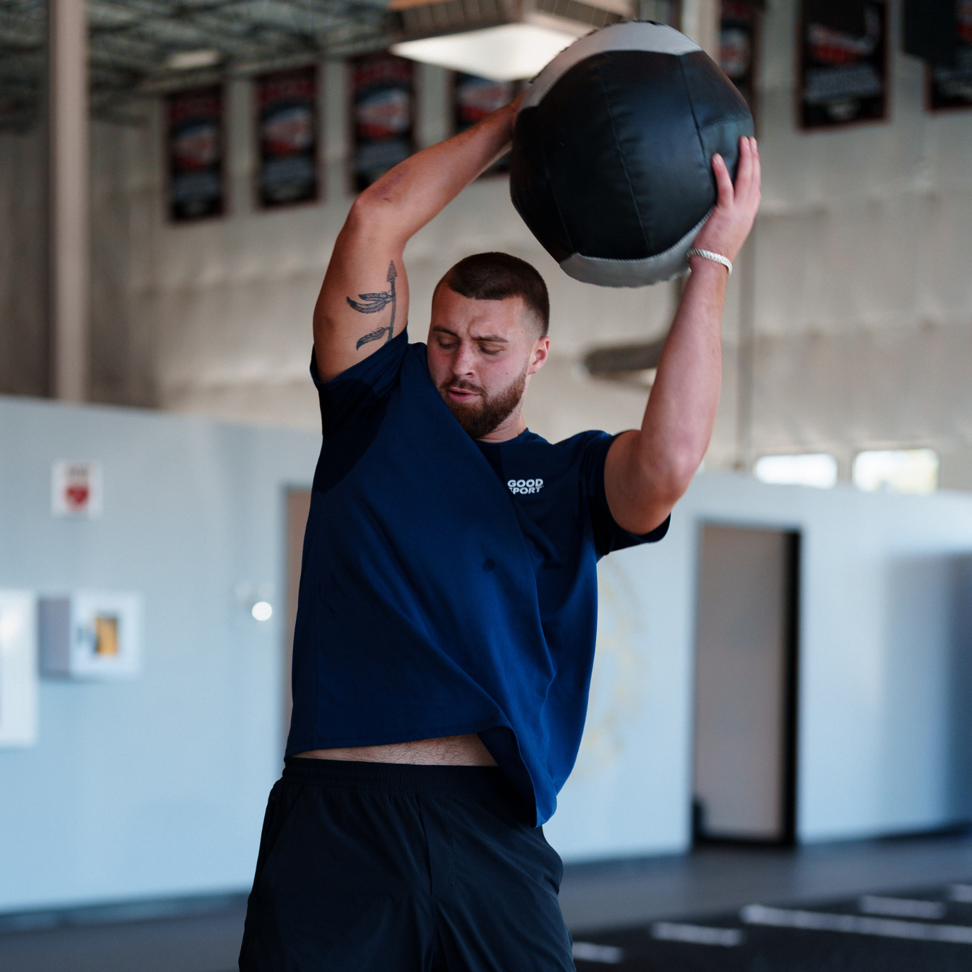 Jake Ferguson throwing weighted ball during workout
