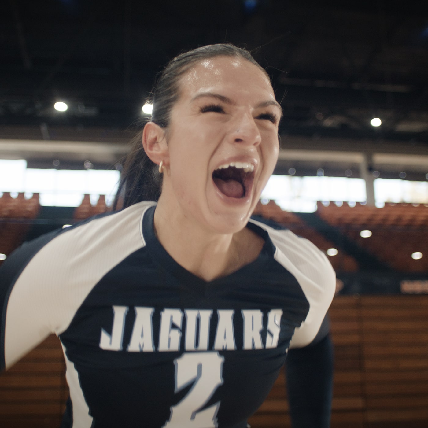 Volleyball athlete cheering to celebrate